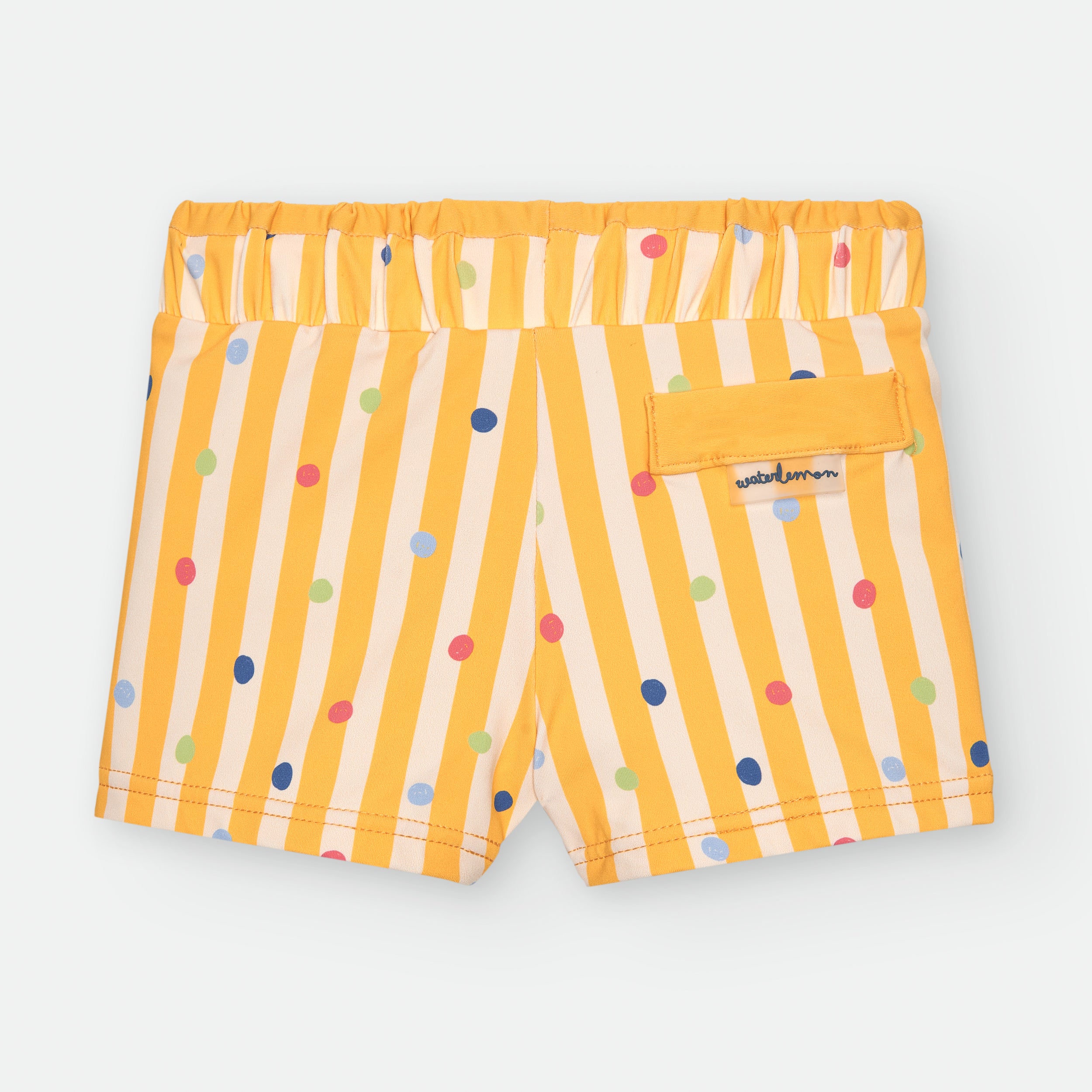 Vista traseira da boxer infantil Waterlemon amarela a riscas e bolinhas, mostrando o cós elástico e um pequeno bolso traseiro com o logótipo da marca.