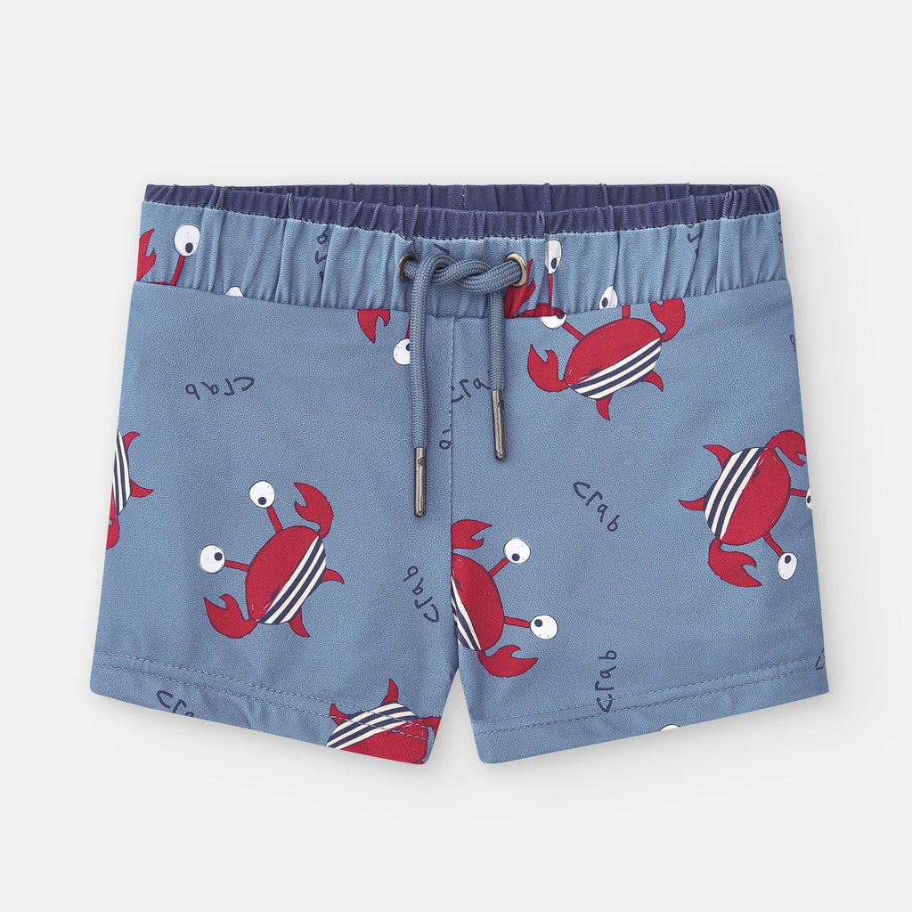 Calção de lycra Waterlemon azul-claro com padrão de caranguejos vermelhos estilizados e a palavra "Crab". Vista frontal com cintura elástica e cordão de ajuste.