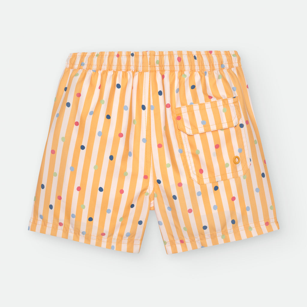 Vista traseira do calção de praia infantil Waterlemon amarelo com riscas e bolinhas, destacando o bolso traseiro com aba.