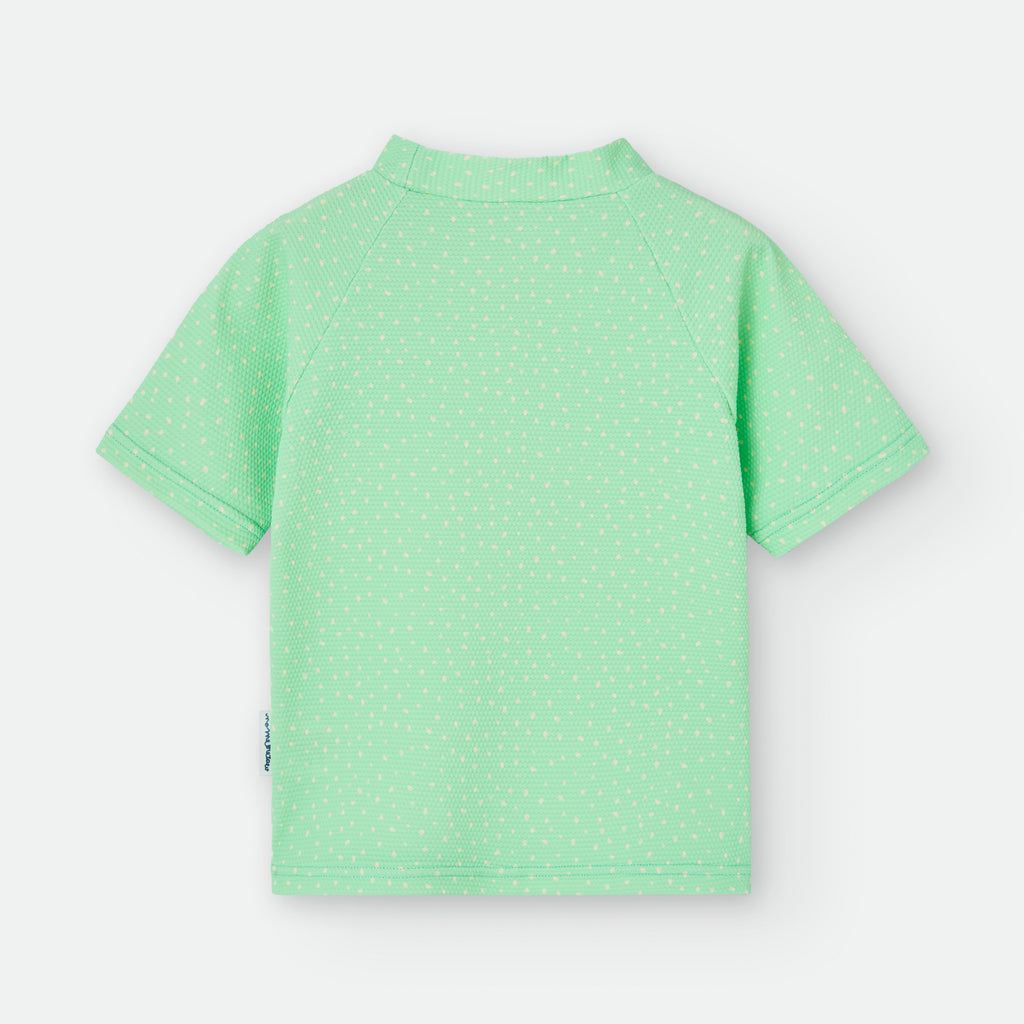Vista traseira da camisola de proteção solar UV Waterlemon verde, mostrando o tecido texturizado e a costura das mangas.
