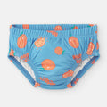 Vista frontal da cueca/fralda de praia Waterlemon azul para menino, com padrão divertido de laranjas sorridentes e elástico nas pernas.