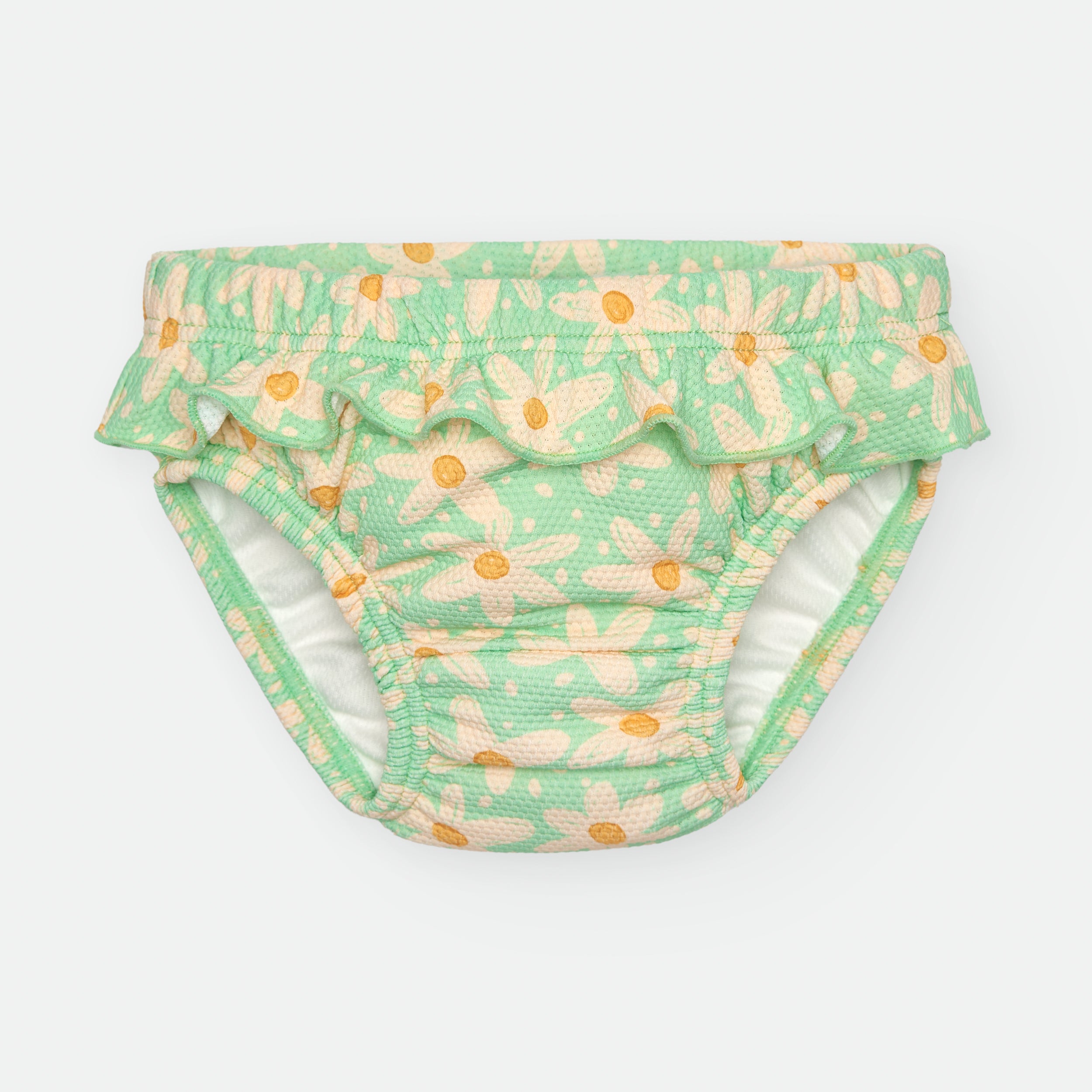 Fralda de praia Waterlemon verde menta com padrão de margaridas claras e folhos na cintura, vista de frente sobre fundo cinza claro.