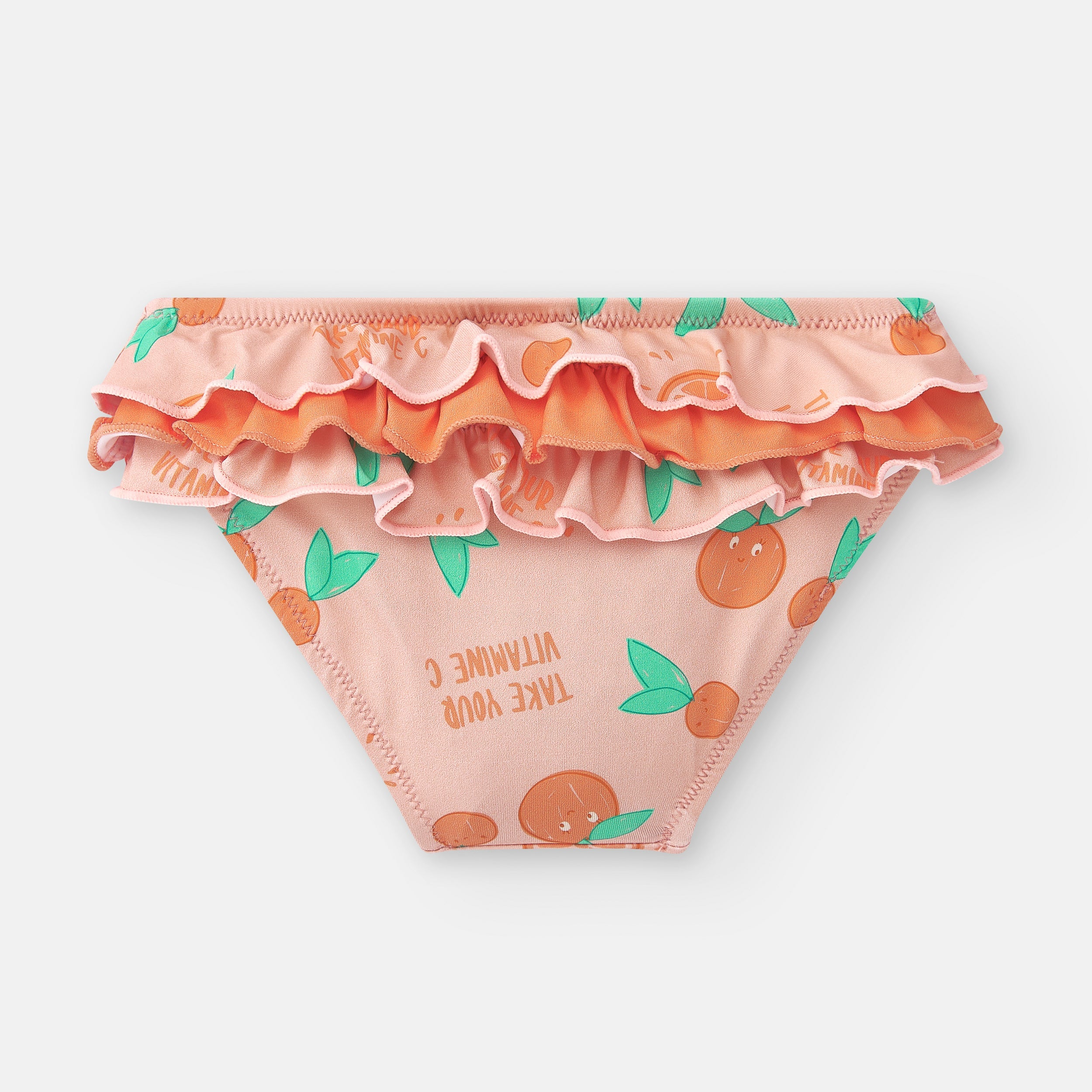 Vista traseira da cueca de praia infantil Waterlemon com laranjas, destacando os folhos e a inscrição "Take Your Vitamine C".