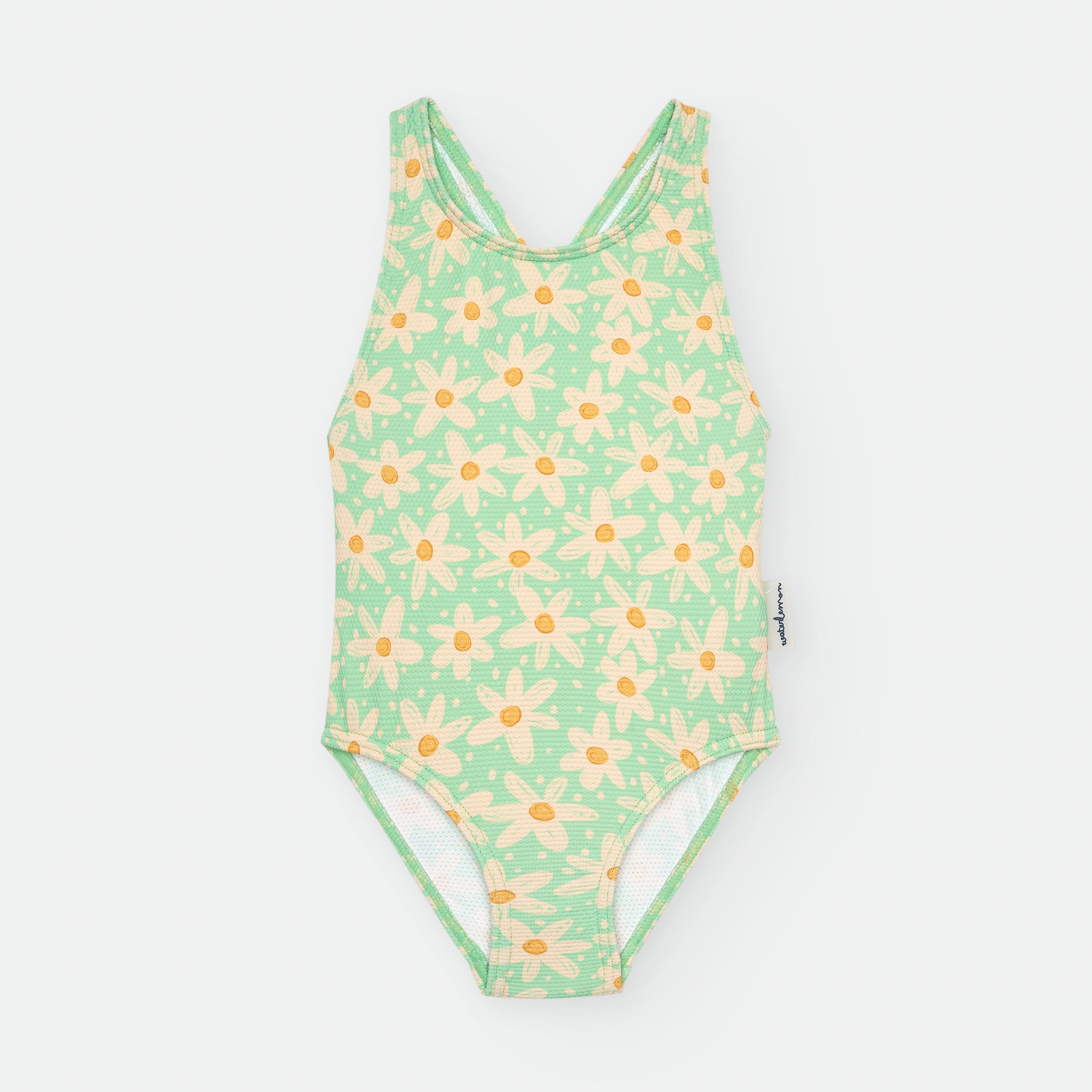 Fato de banho infantil Waterlemon de uma peça, verde menta com padrão de margaridas amarelas. Vista frontal com alças cruzadas.
