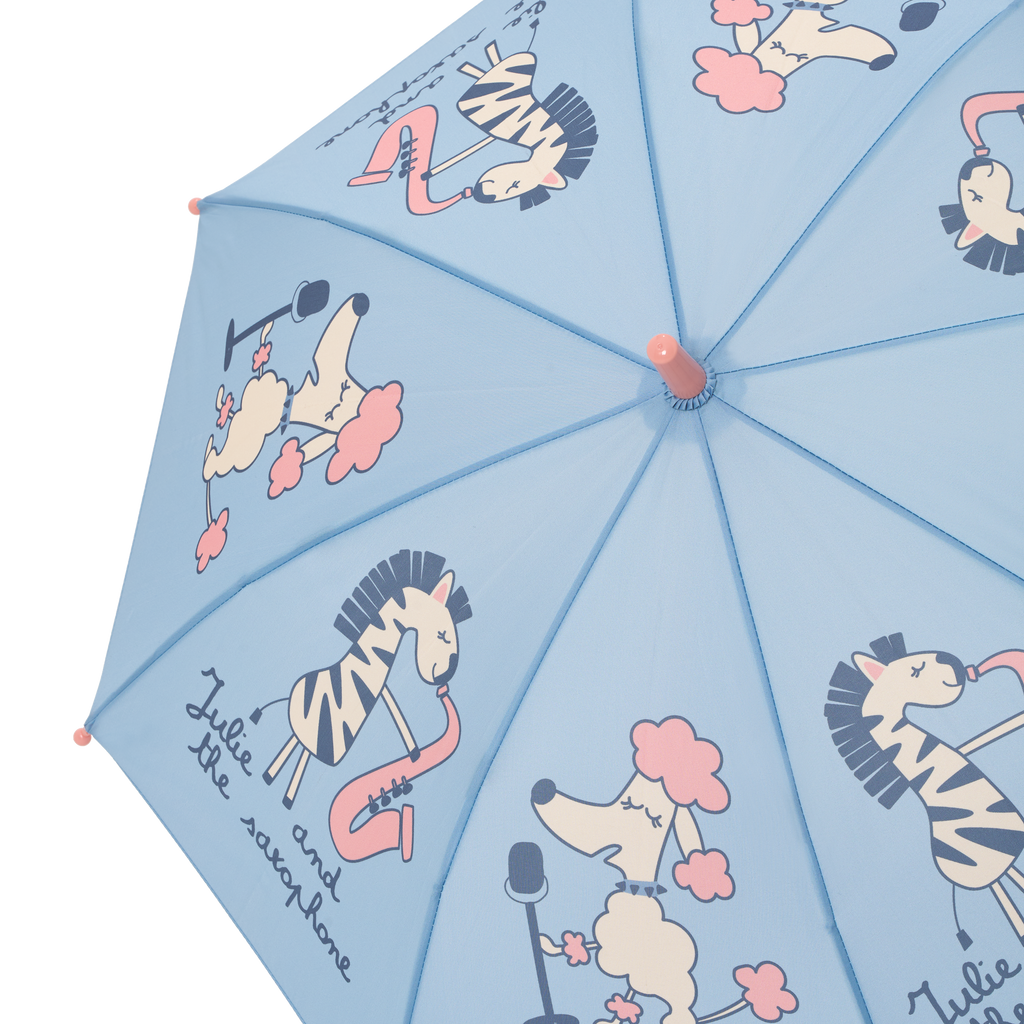 Detalhe do topo do guarda-chuva Waterlemon, focando nas ilustrações vibrantes da zebra a tocar saxofone e do caniche. Tecido resistente.