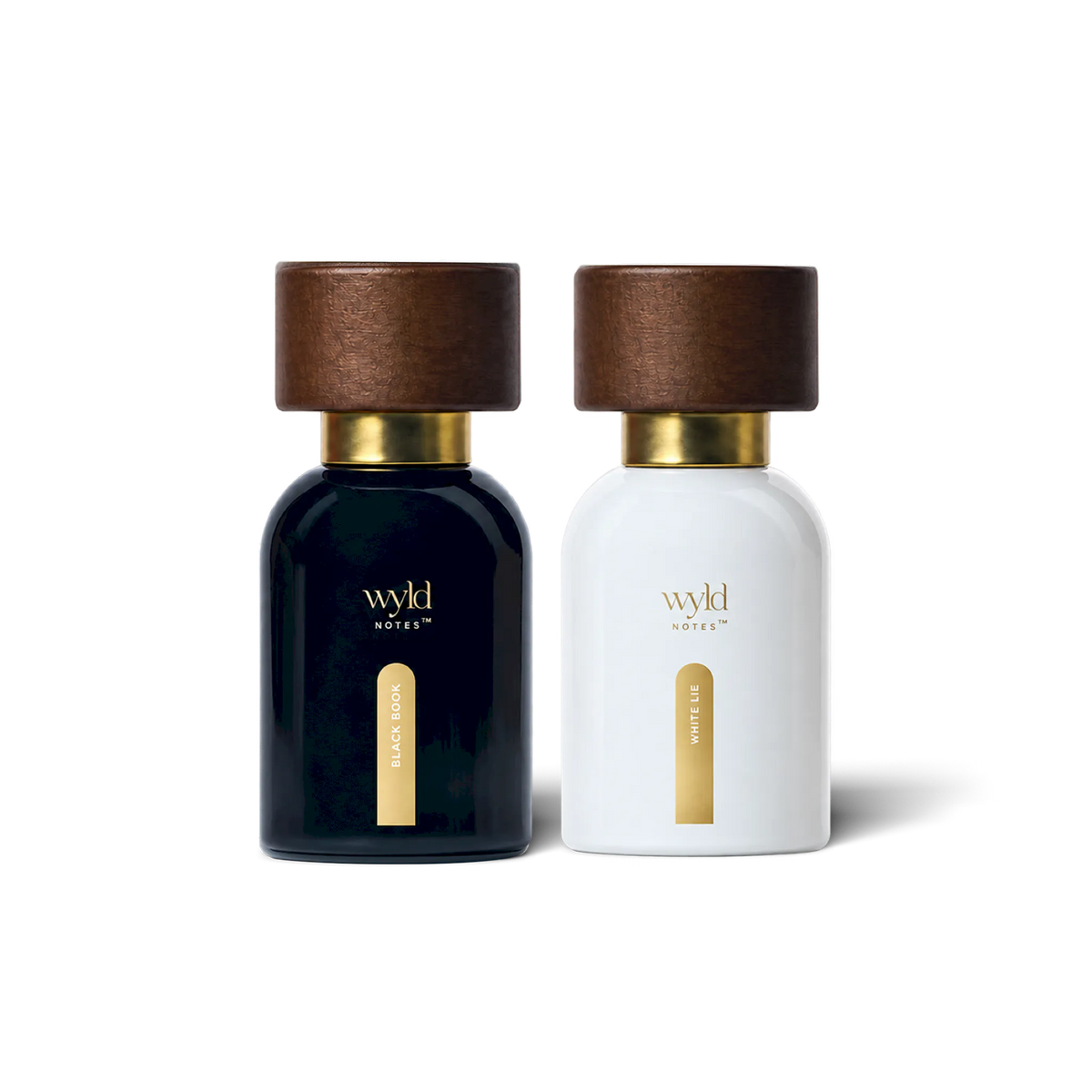 Frascos de perfume natural Wyld Notes Black Book e White Lie de 30 ml com tampa de madeira, sobre fundo branco