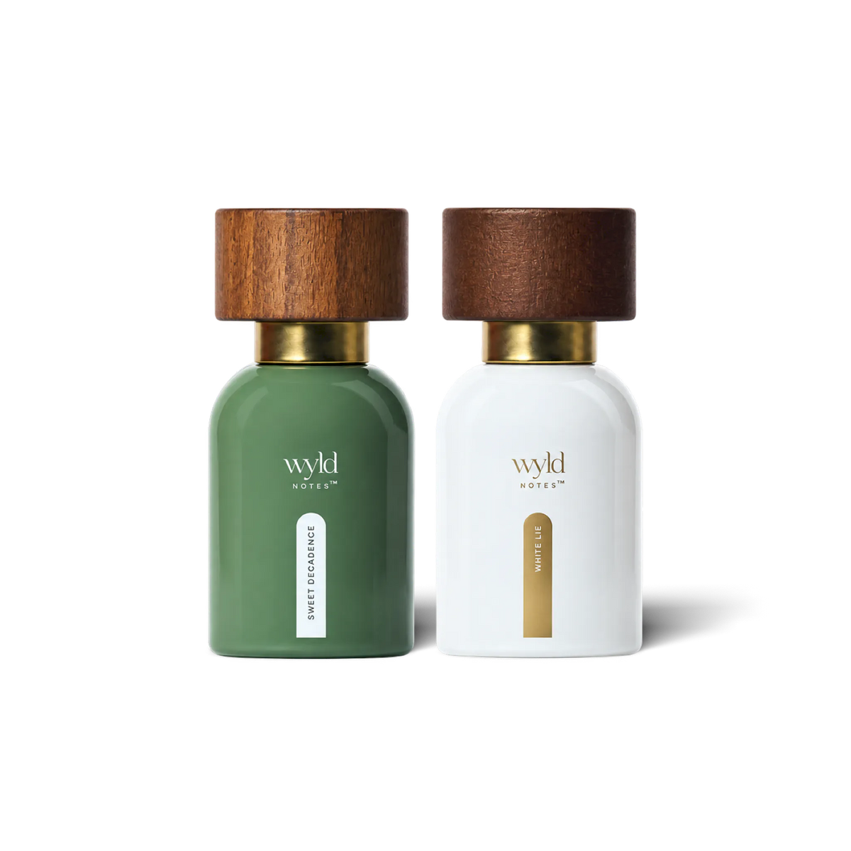 Frascos de perfume natural Wyld Notes White Lie e Sweet Decadence de 30 ml com tampa de madeira, sobre fundo branco
