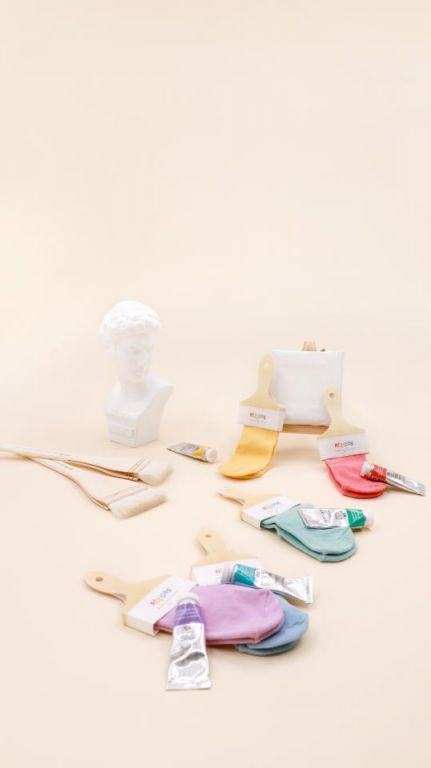 Etiqueta ou embalagem das meias Attipas ATTISOCKS, confirmando o tamanho S (0 a 12 meses) e a composição em bambu.