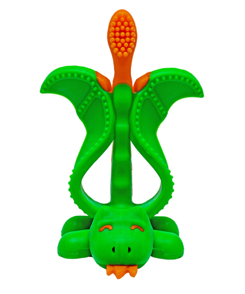 Mordedor e escova de dentes Baby Banana em formato de dragão, verde com detalhes em laranja, visto de frente sobre fundo branco.