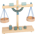 Balança de madeira small foot com duas cestinhas, pesos e um mostrador de medidas, ideal para brincadeiras educativas de crianças a partir dos 3 anos.