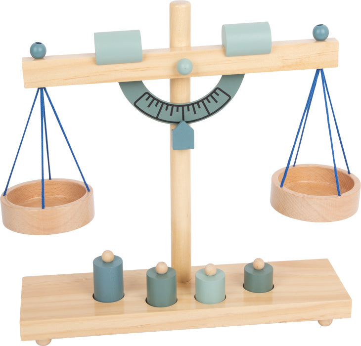 Balança de madeira small foot com duas cestinhas, pesos e um mostrador de medidas, ideal para brincadeiras educativas de crianças a partir dos 3 anos.