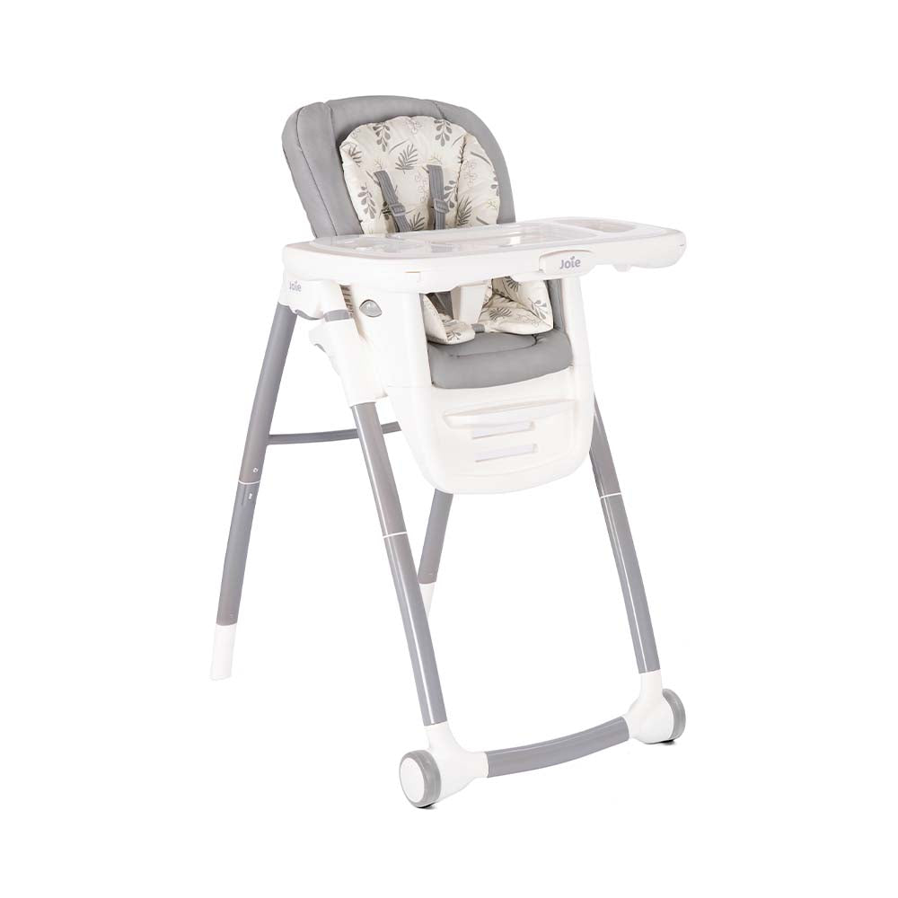 Cadeira Joie Multiply convertida em assento elevatório, fixada a uma cadeira de adulto para criança mais velha.