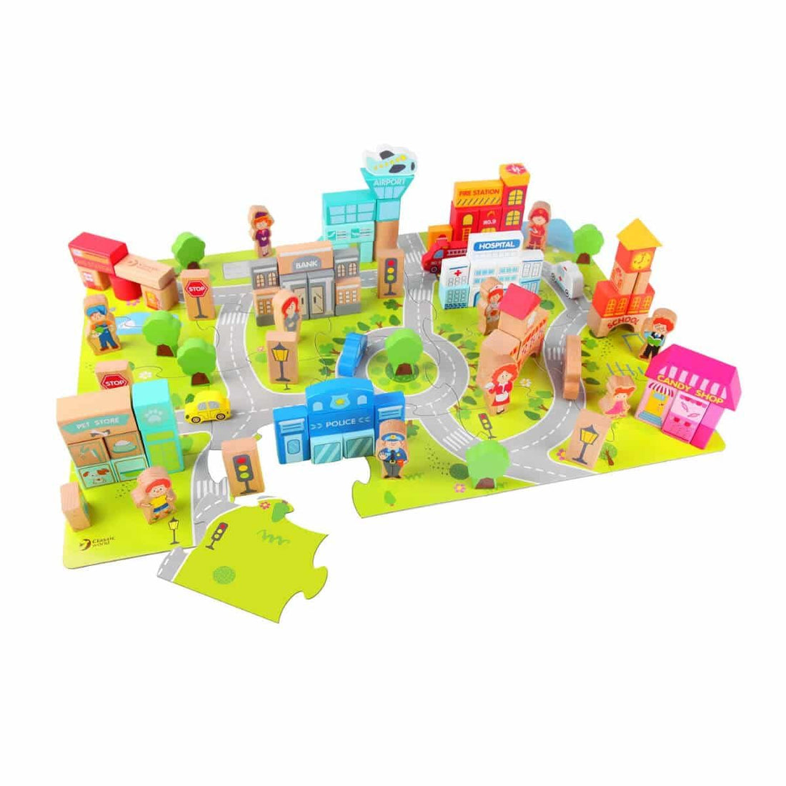 Visão geral do conjunto Classic World Blocos de Construção 'Cidade', mostrando diversos edifícios, figuras e peças de puzzle num tapete com estradas.
