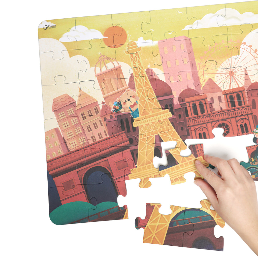 Imagem da embalagem do puzzle Classic World 48 peças "Coco na França", com a mascote Coco e informações de idade (+3 anos).