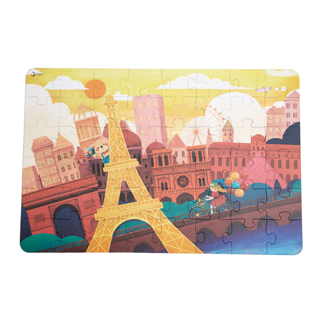 Puzzle Classic World 48 peças "Coco na França" montado, mostrando o urso Coco junto à Torre Eiffel em Paris.