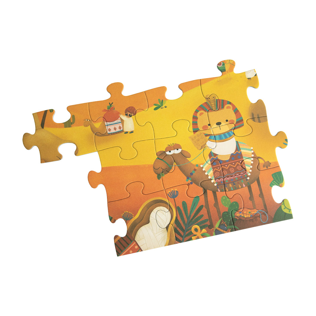 Close-up de algumas peças do puzzle "Coco no Egipto", destacando os detalhes dos desenhos e personagens.