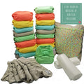 Pack completo Close Pop In com 20 fraldas reutilizáveis de bambu em tons pastel, absorventes e saco impermeável.