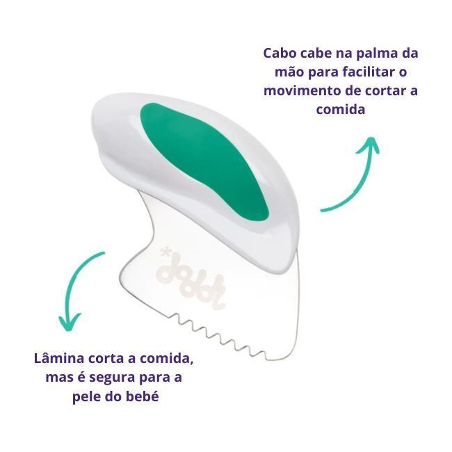Detalhe da faca infantil Doddl rosa com cabo ergonómico que encaixa na palma da mão da criança.