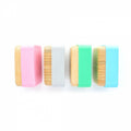Pack de 2 recipientes Eco Rascals em bambu: um rosa claro e um cinza, com tampas de silicone, ideais para snacks infantis.