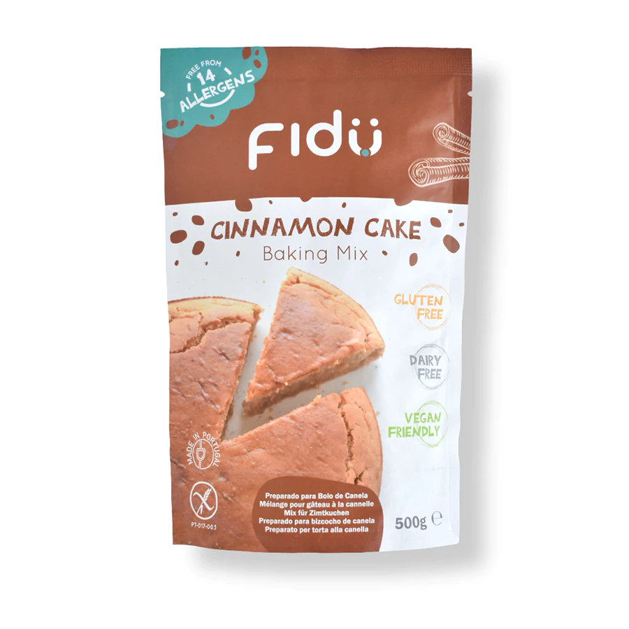 Tabela nutricional e lista de ingredientes do preparado para bolo de canela Fidu Mix sem glúten 500gr, destacando a ausência de alergénios principais.