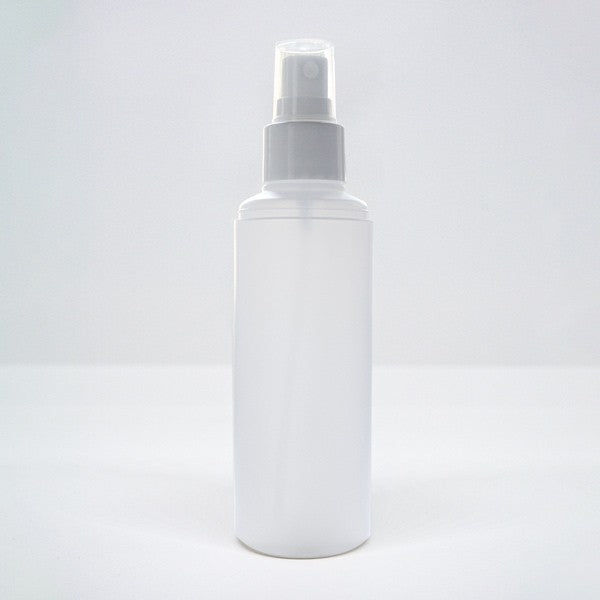 Frasco cilíndrico transparente de 150ml com pulverizador de acionamento manual, ideal para cosméticos.