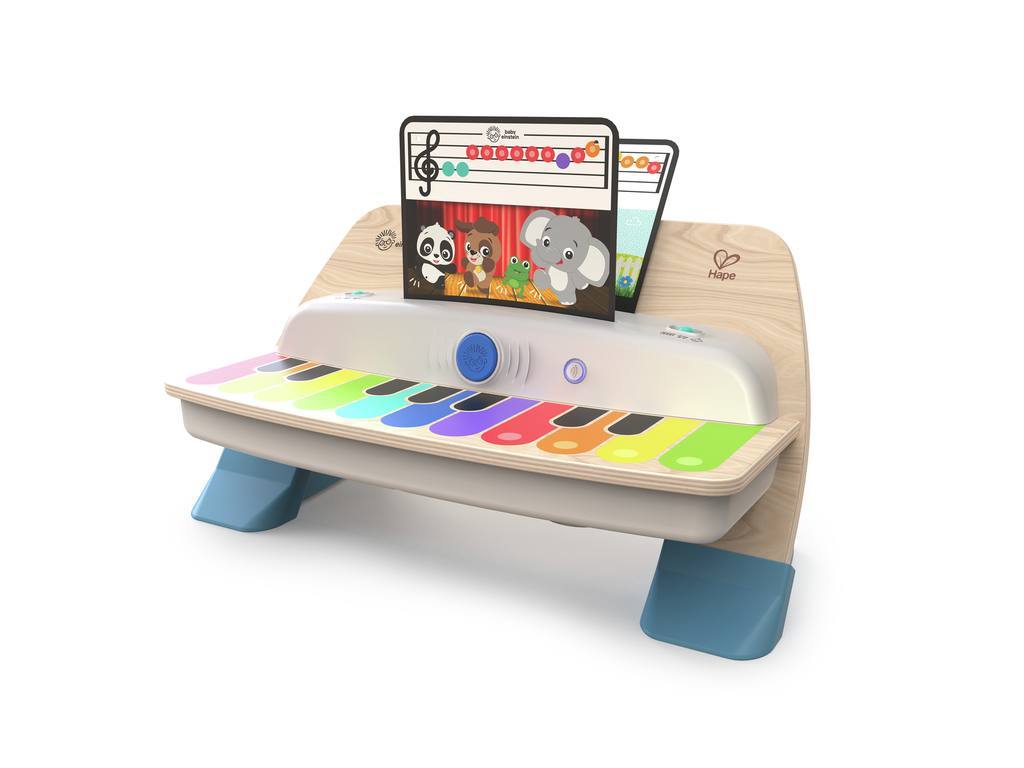 Piano Mágico Deluxe Hape Baby Einstein com superfície de toque mágica, sem botões, em madeira clara e detalhes coloridos.