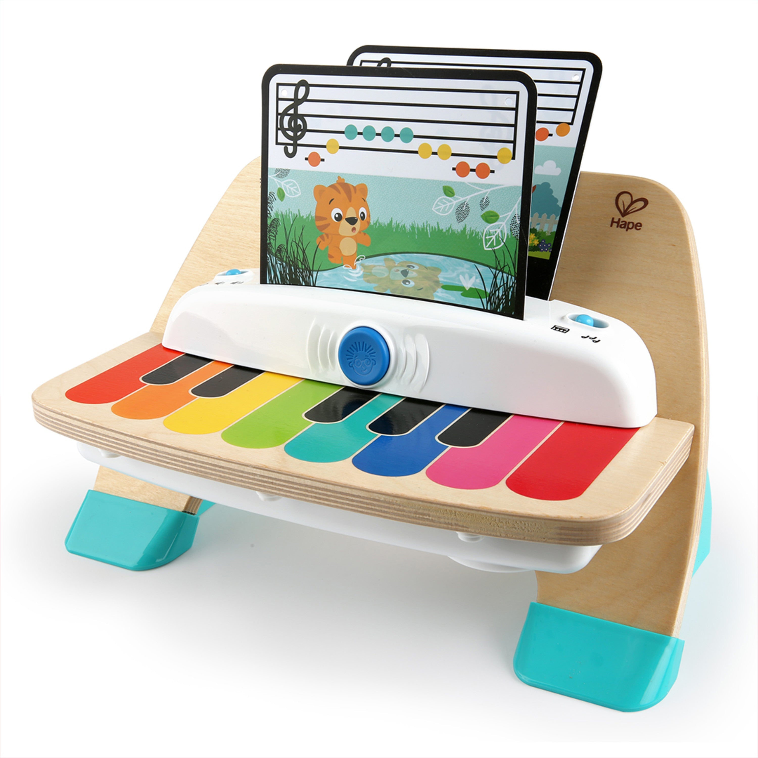 Bebé a tocar no piano de madeira Magic Touch da Hape e Baby Einstein.