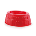 Molde de plástico vermelho da Hape com formato circular, desenhado para moldar a areia no formato do Coliseu Romano.