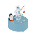 Caixa musical magnética da Janod com pinguim e urso polar em madeira sobre base azul.