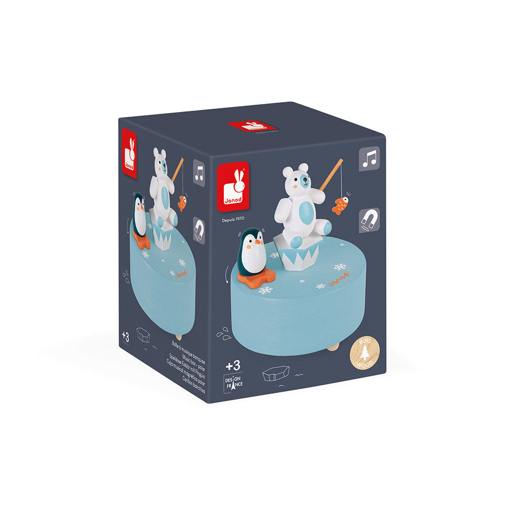 Imagem de embalagem da Janod Caixa musical magnética Polar, com dimensões e informações de segurança visíveis.