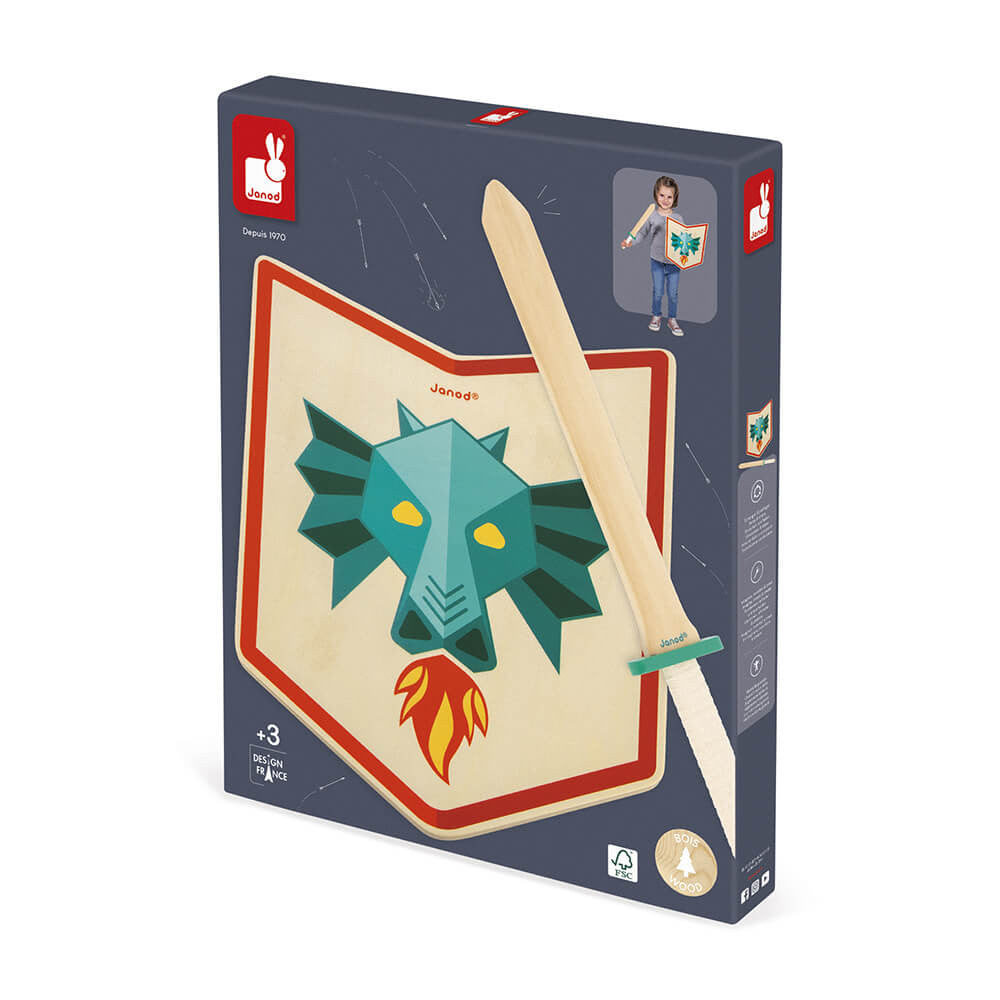 Conjunto completo Janod Dragão (escudo e espada) exibido em fundo neutro, pronto para brincar.