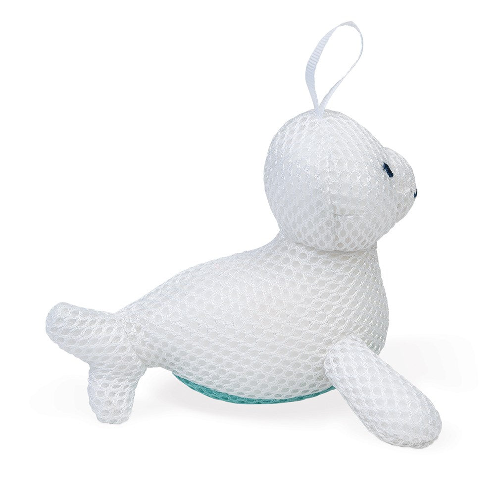Esponja de banho Janod em forma de foca branca vista de lado.