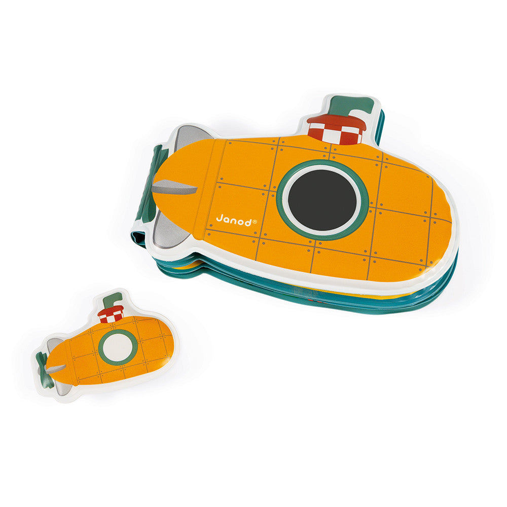 Livro Submarino Janod fechado e mini submarino destacável em ângulo.