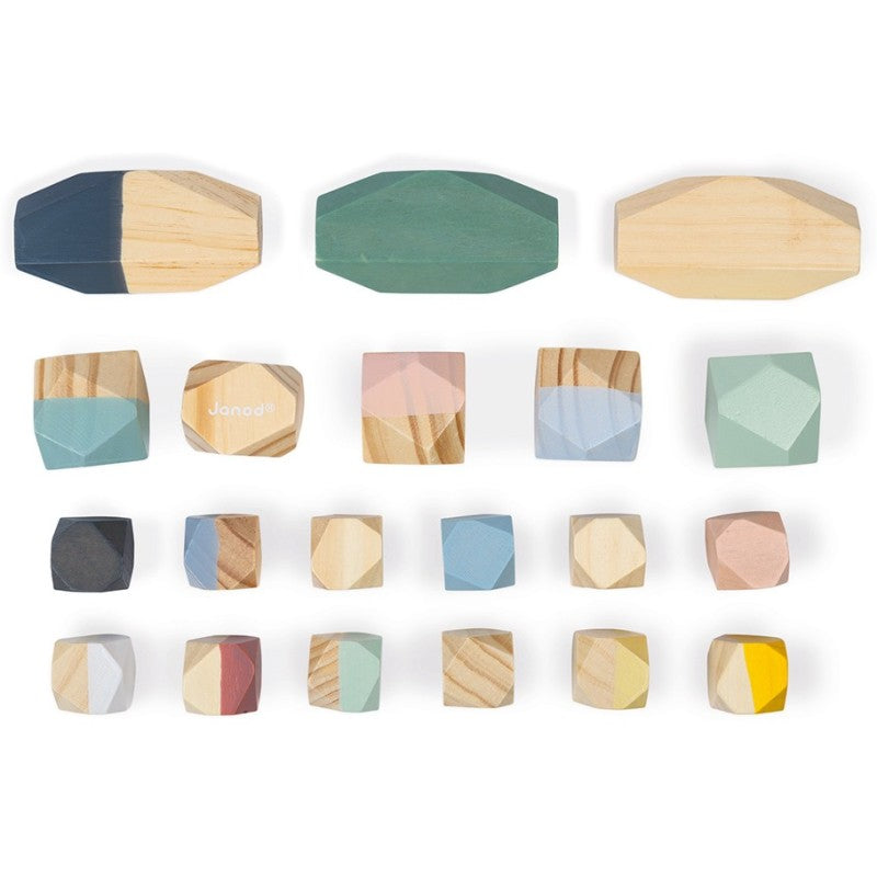 Vista superior das 20 Janod Pedras para empilhar Sweet Cocoon de madeira e cores pastel.