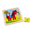 [Puzzle de madeira Janod de 9 peças com ilustração do cavalo Tornado num campo florido.]