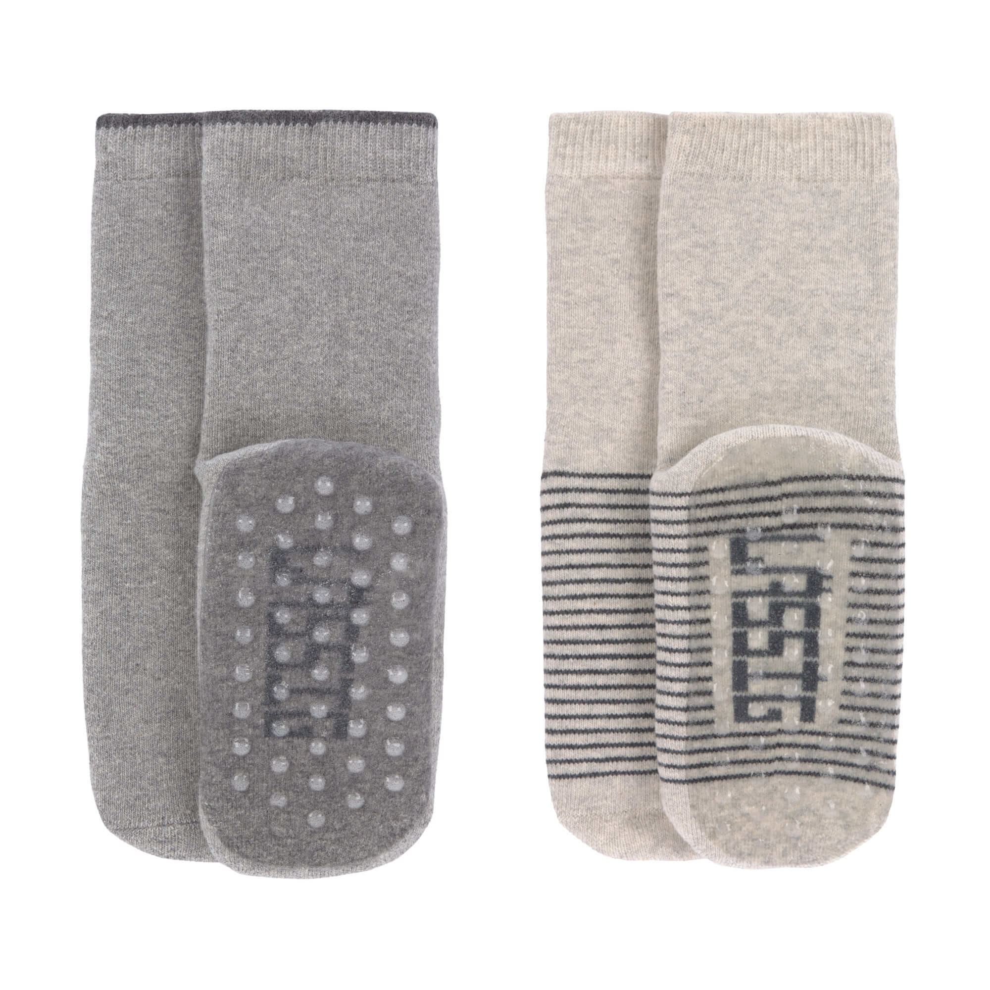 Conjunto de duas meias antiderrapantes Lassig, uma cinza e outra bege, com solas de silicone visíveis para segurança.