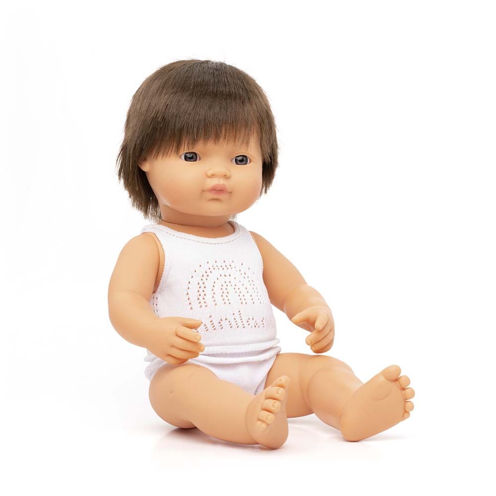 Boneco bebé Miniland caucasiano, de 38cm, em embalagem de caixa aberta, pronto para ser vestido com roupa Miniland.