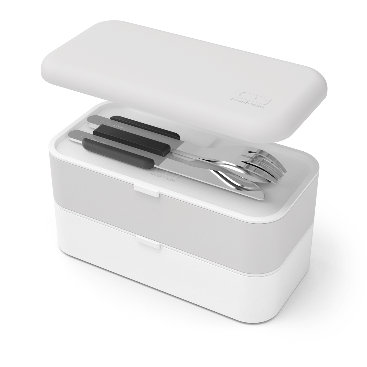Imagem de comparação de tamanho: os talheres Monbento ao lado de uma régua, ilustrando as dimensões compactas (aprox. 17 cm).