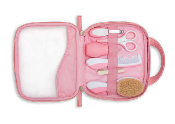 Detalhe da escova de lã macia e do pente ergonómico do kit de higiene Nuvita para recém-nascidos e bebés.