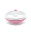 Prato térmico Nuvita rosa com ventosa, mostrando o compartimento principal e a tampa, ideal para manter a papa quente.
