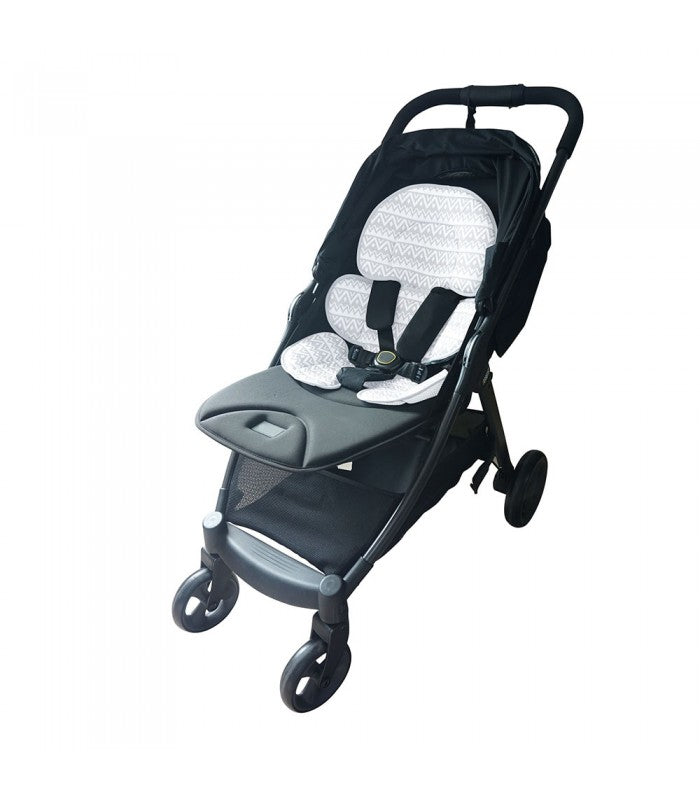 Vista lateral da capa redutora Olmitos, com apoio de cabeça ajustável por velcro, adaptável ao crescimento do bebé.