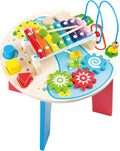 Mesa de atividades musical 2 em 1 da small foot, vista geral mostrando o xilofone, engrenagens, e peças geométricas. Brinquedo educativo para crianças a partir de 18 meses.