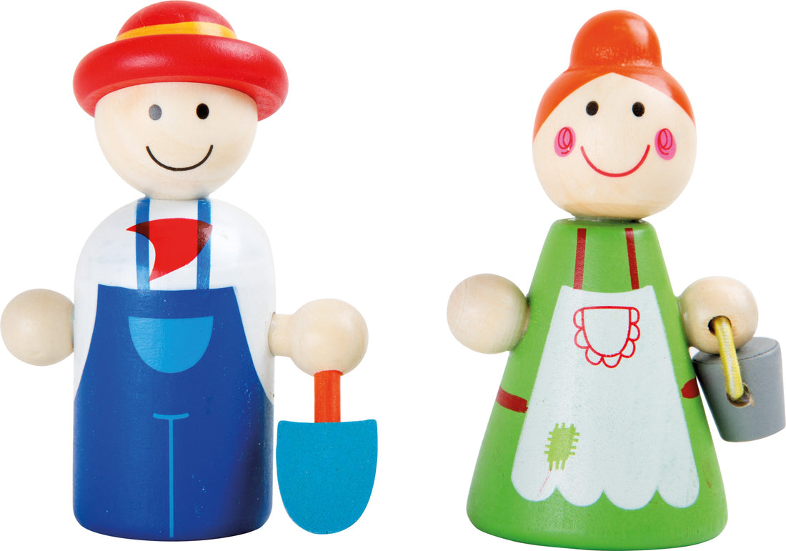Conjunto de brincar da quinta small foot, em madeira, com figuras de animais e agricultores, apresentado numa mala portátil.