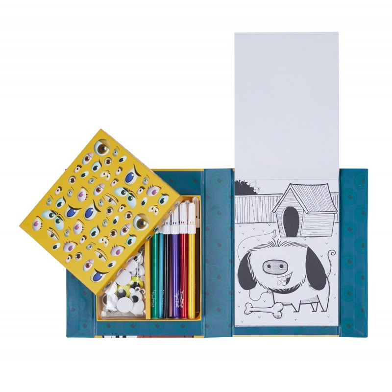 Vista superior do kit Tiger Tribe aberto, mostrando o compartimento dos marcadores e autocolantes de olhos e uma página de desenho de um cão com um osso.