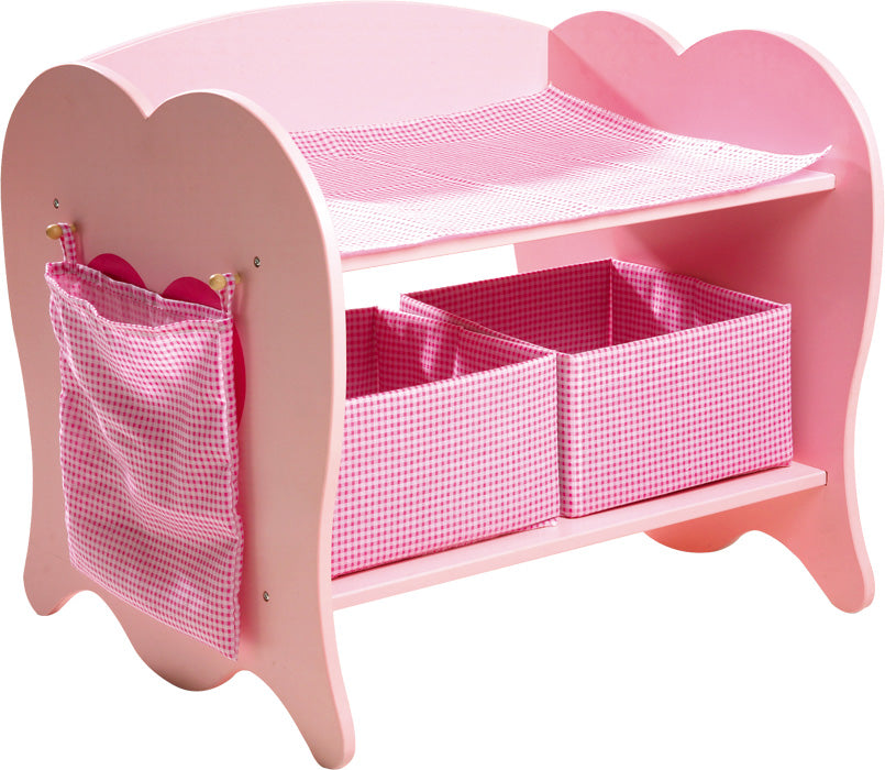 Trocador de bonecas small foot rosa em madeira, com dois cestos de tecido e um bolso lateral, ideal para brincadeiras de imitação e organização de acessórios.
