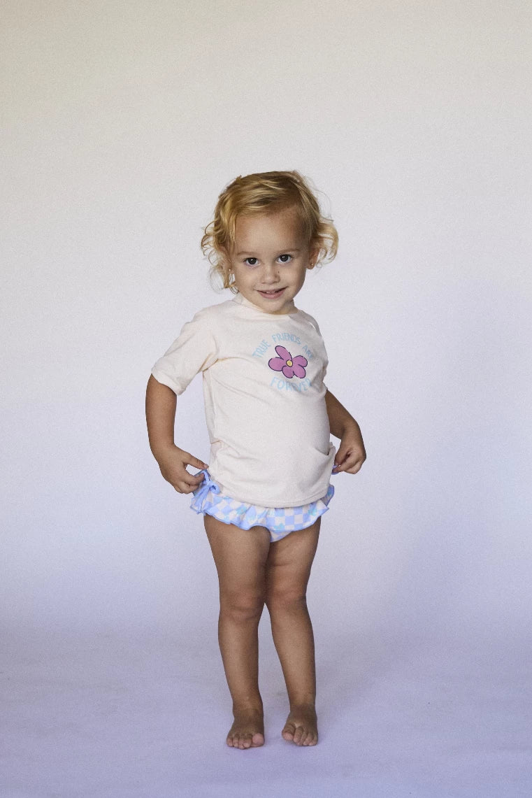 Vista traseira da camisola de natação Waterlemon, evidenciando o corte e o ajuste confortável para crianças.