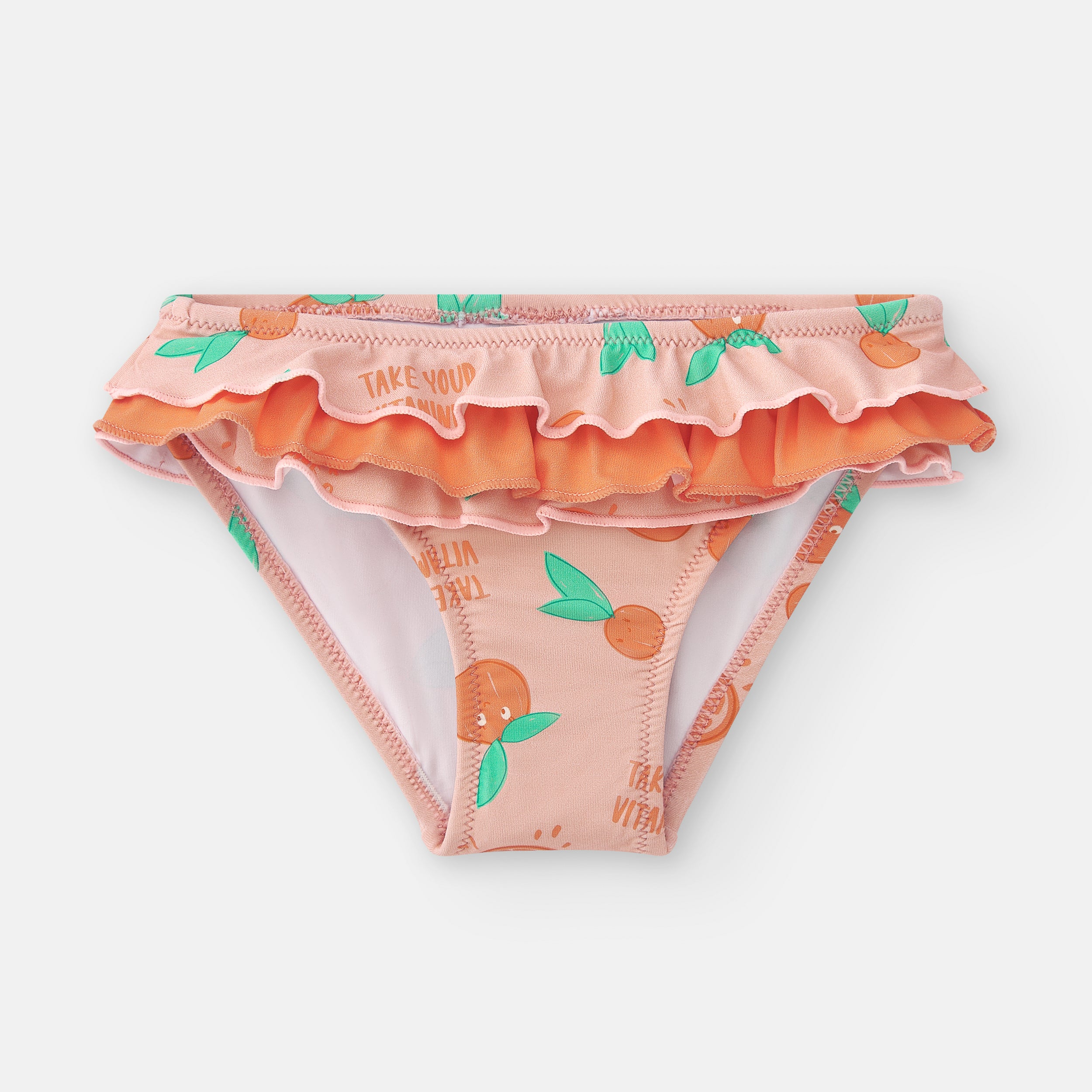 Detalhe dos folhos duplos e elásticos da cueca de banho Waterlemon, evidenciando a qualidade do acabamento.