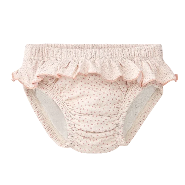 Cueca/fralda de praia Waterlemon rosa com bolinhas, vista frontal, com folho decorativo e elástico nas pernas.