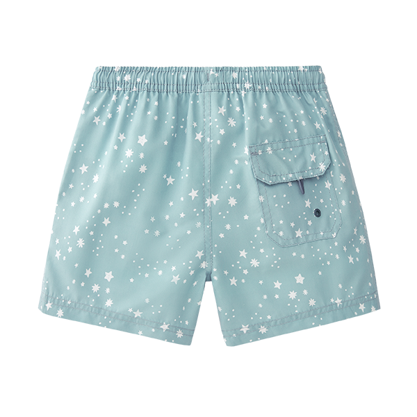 Vista traseira do calção de praia Waterlemon azul com estrelas, destacando o bolso traseiro com fecho de velcro.