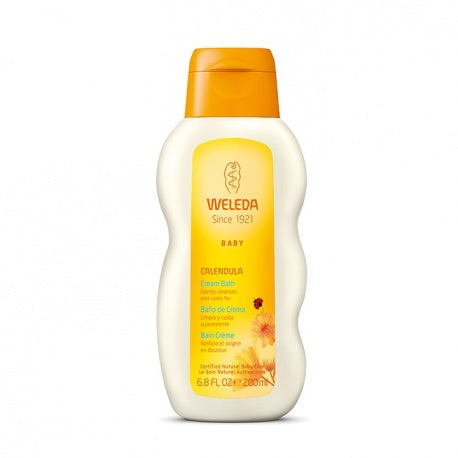 Frasco de Weleda Banho de Creme de Calêndula, com destaque para o rótulo que indica "Calendula Cream Bath" e os ingredientes naturais.